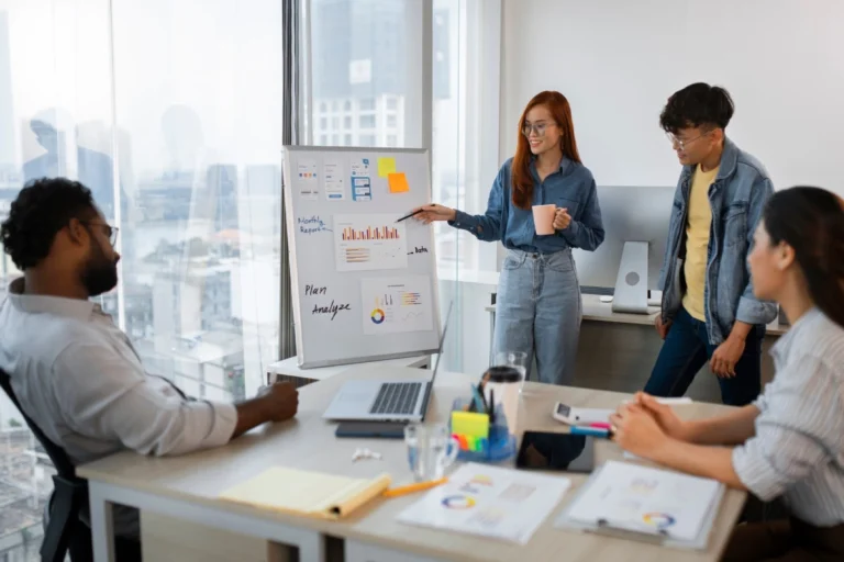 medium-shot-colleagues-working-together_23-2150152266